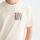Light Gray טי שירט לגברים Front And Back Artwork SCOTCH & SODA