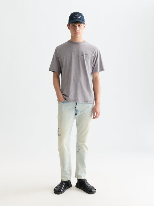 White Smoke טי שירט Basquiat לגברים עם הדפס קדמי ואחורי SCOTCH & SODA