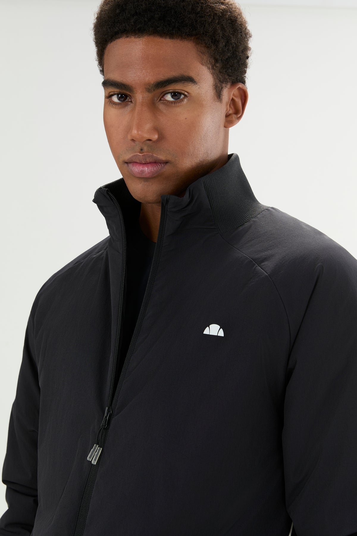 Black FERALA JACKET-GIOCO INVERNALI ג'קט ELLESSE‎