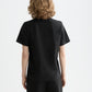 Black טי שירט קצרה לנשים Core Chest Artwork SCOTCH & SODA